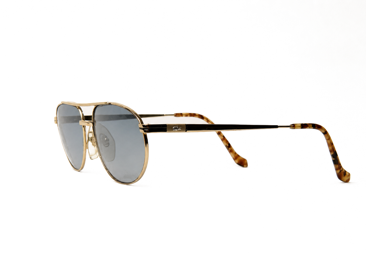 RV-029 · Lacoste — 723 · trois-quarts · fond blanc neutre